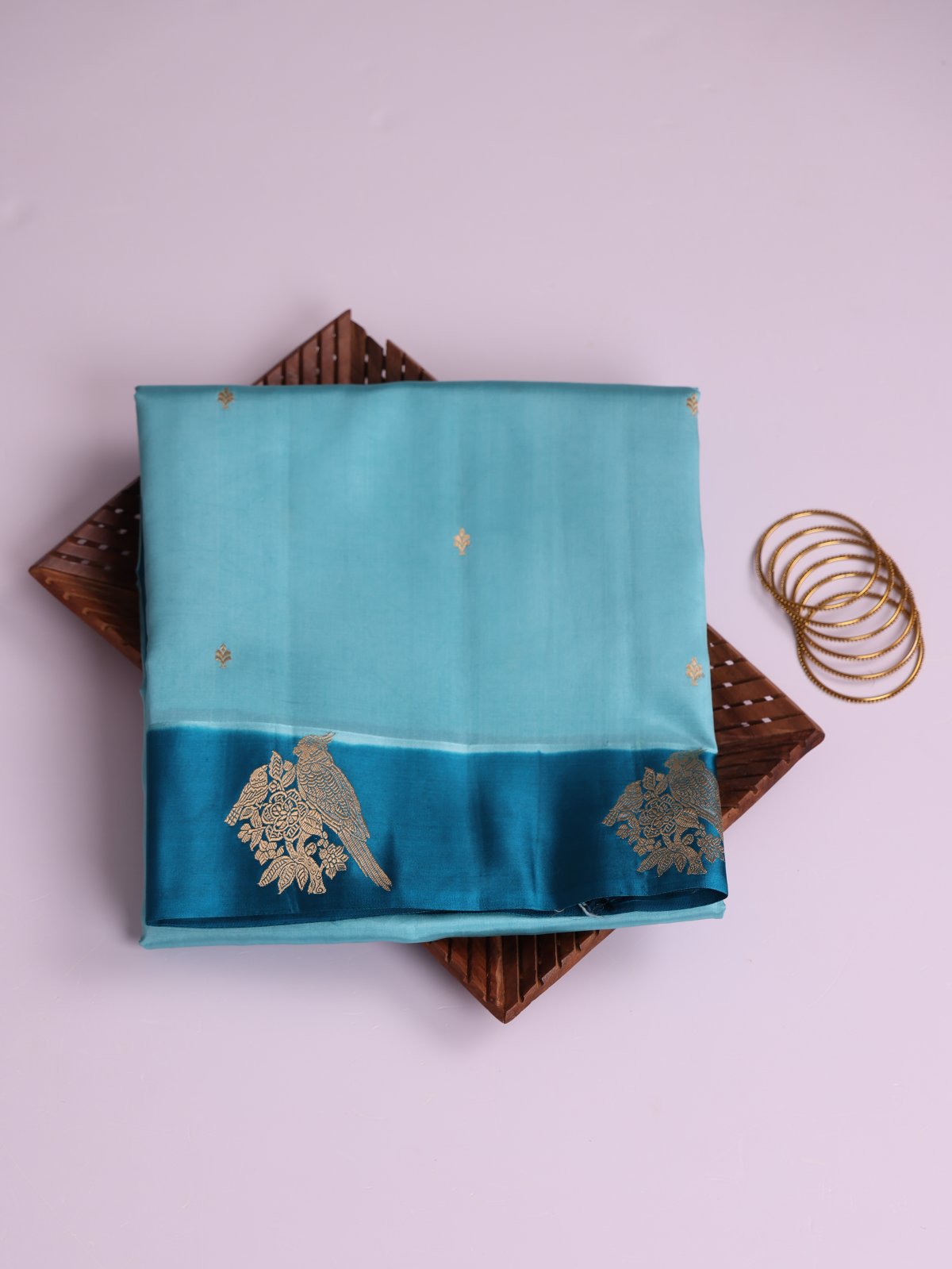 Light Blue Mashru Silk Saree With Teal Blue Satin Border