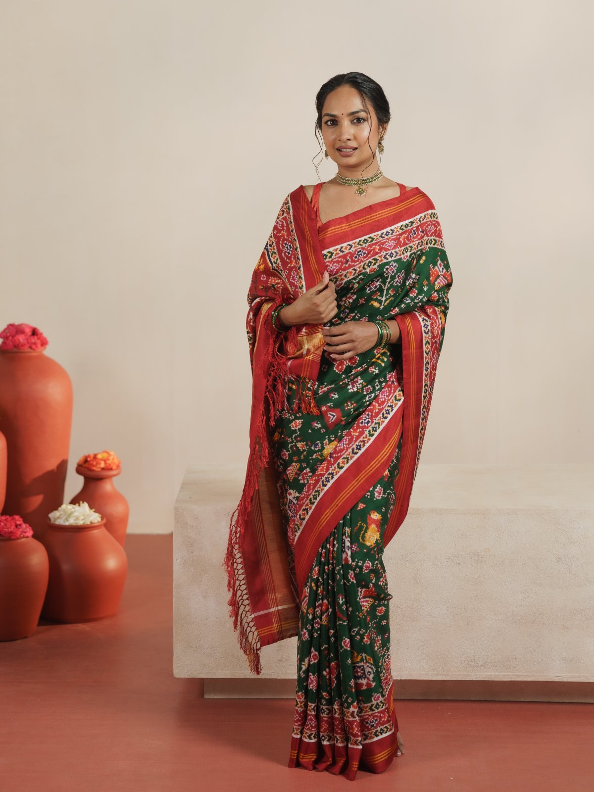 Curated 9 - Bottle Green Patan Patola Silk Saree With Red Border
