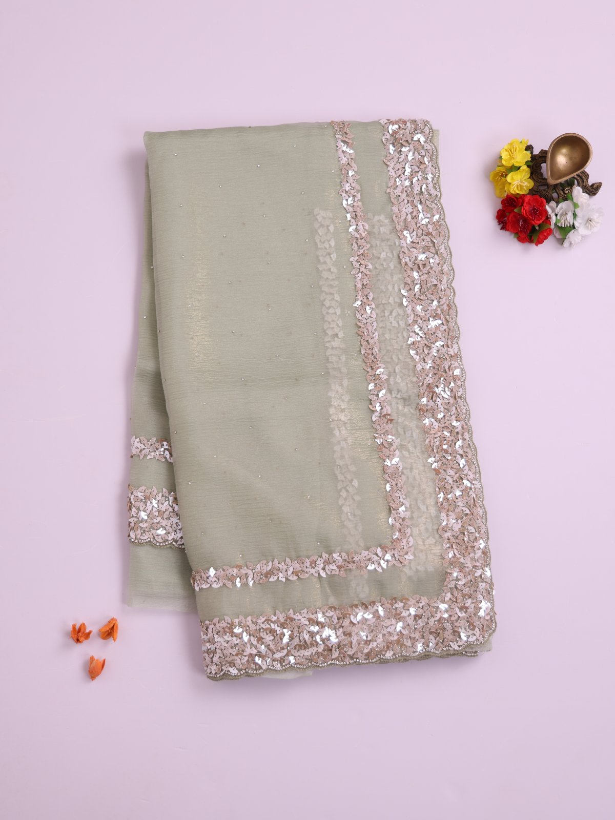 Pastel Green Crushed Georgette Silk Saree With Sequins Border