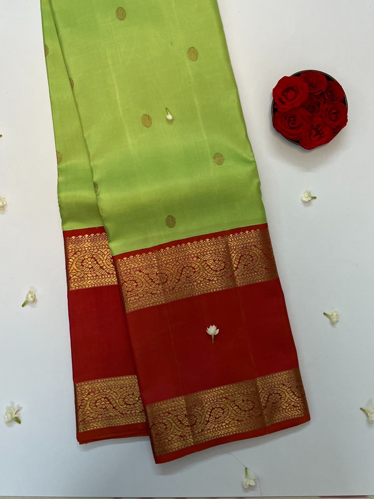 Green Kanjeevaram Silk Saree With Orange Border