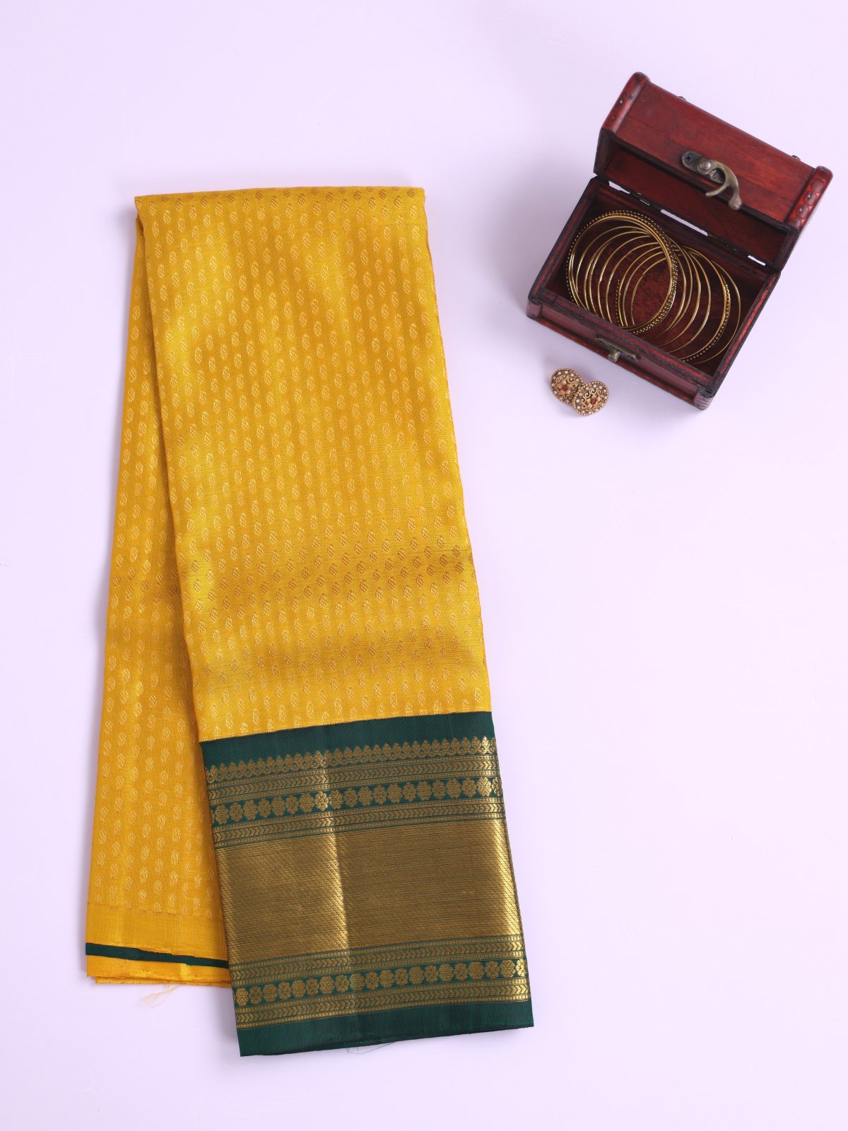 Mustard Yellow Kanjeevaram Silk Pavadai With Bottle Green Border