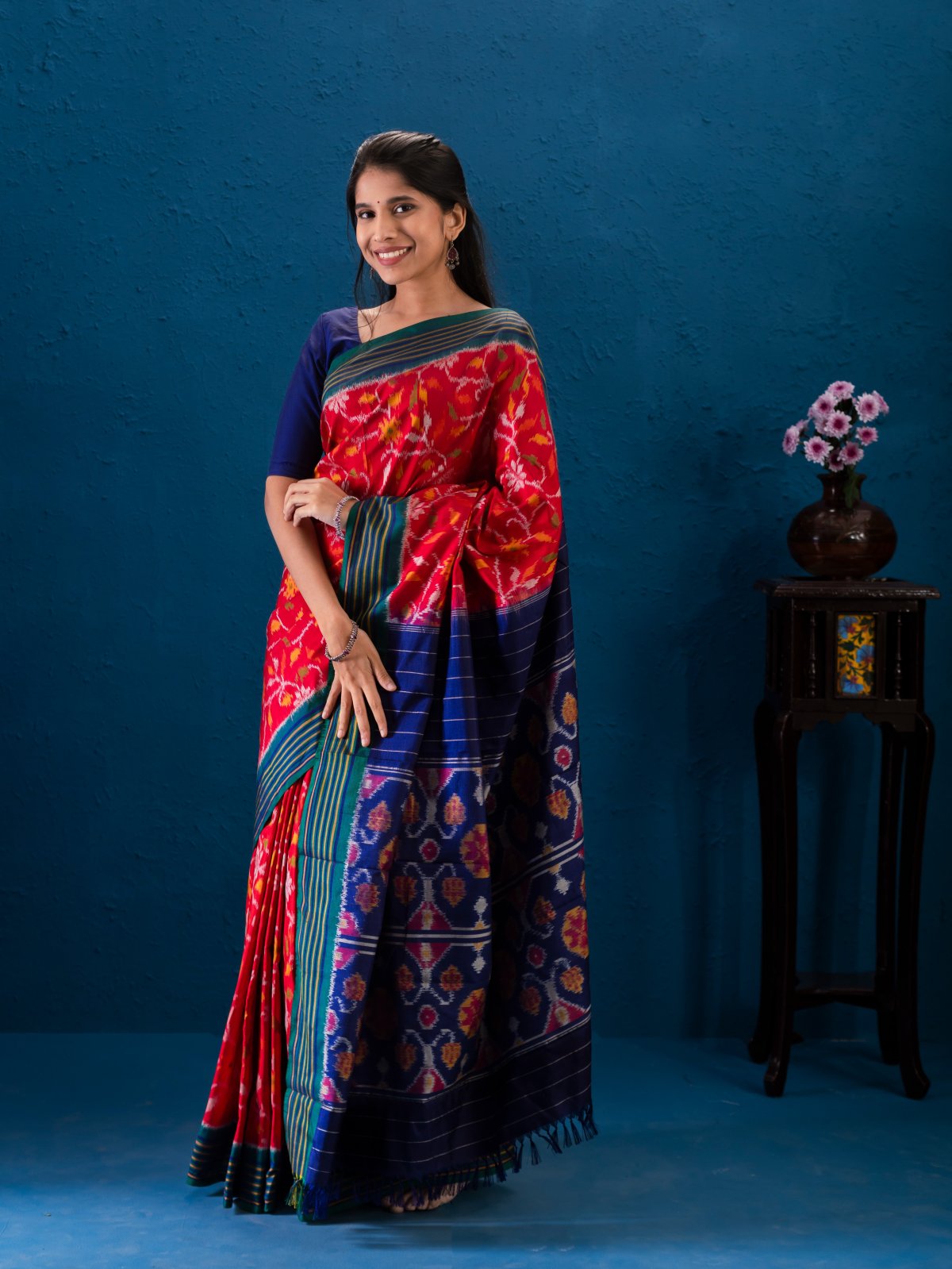 Pinkish Red Patola Silk Saree with Green Border