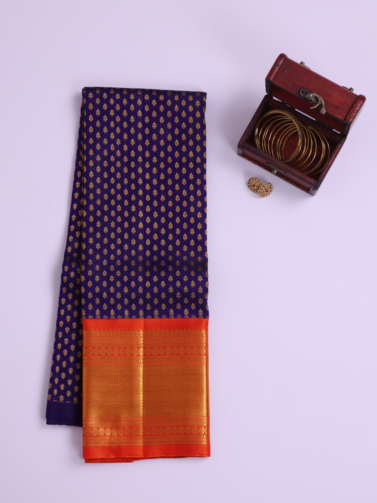 Dark Violet Kanjeevaram Silk Pavadai With Orange Border 